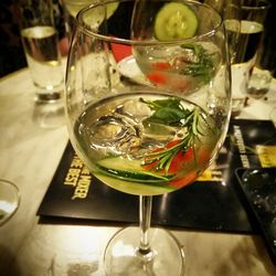 Close-up of wine glasses on table