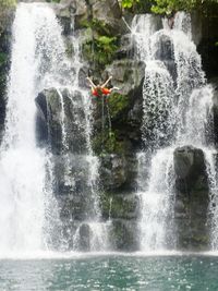 Man splashing water