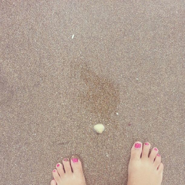 personal perspective, beach, sand, person, low section, human foot, barefoot, part of, high angle view, shore, unrecognizable person, leisure activity, lifestyles, sunlight, footprint, day