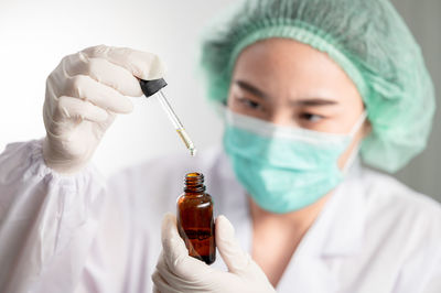 Close-up of scientist working in laboratory