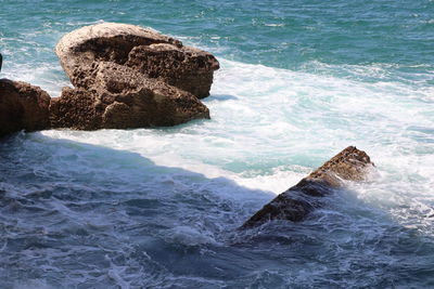 View of rocks in sea