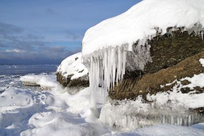 Scenic view of snowcapped mountains against sky during winter