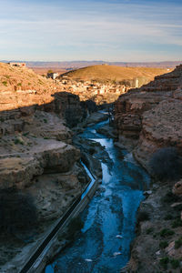 High angle view of river amidst rock formations