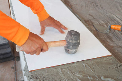 High angle view of man working on wood