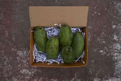 High angle view of mangos in the box 