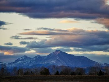 Scenic view of mountains against dramatic sky