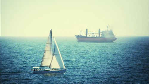 Boats sailing in sea