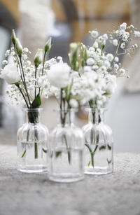 Close-up of white flower vase on table