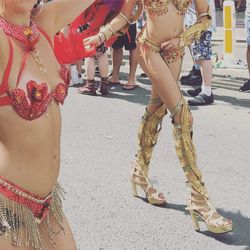 Low section of women standing on street