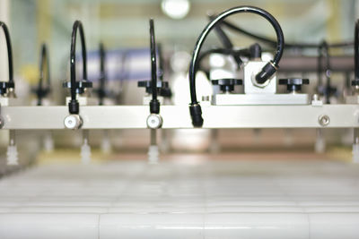 Close-up of faucet in bathroom