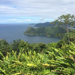 Scenic view of sea against cloudy sky