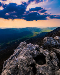 Scenic view of mountains against sky during sunset