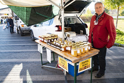 Man standing at market stall