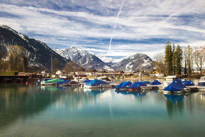 Scenic view of lake against sky during winter