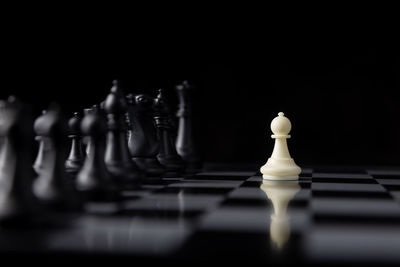 Close-up of chess against black background