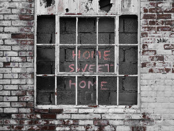 Graffiti on wall of old building