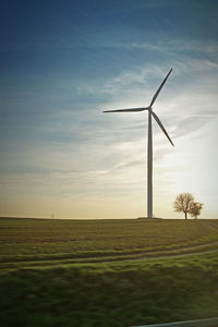 Wind turbines on field