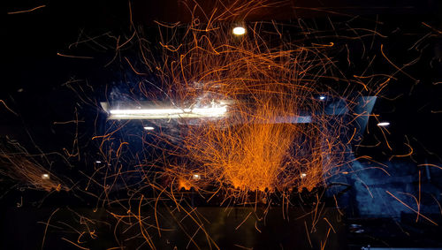 Close-up of illuminated fireworks at night