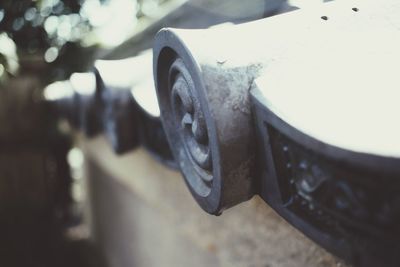 Close-up of car on road