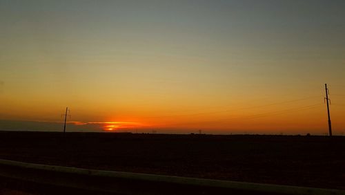 Scenic view of landscape at sunset