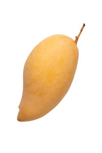 Close-up of lemon slice against white background