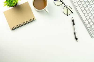 High angle view of coffee cup on table