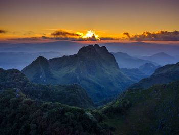 Scenic view of mountains against sky during sunset