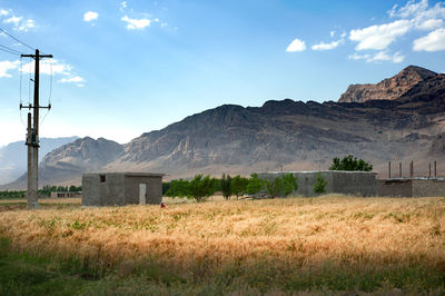 Scenic view of field against mountains