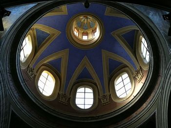 Low angle view of illuminated ceiling of building