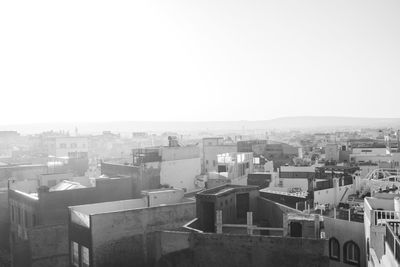 High angle view of buildings against clear sky