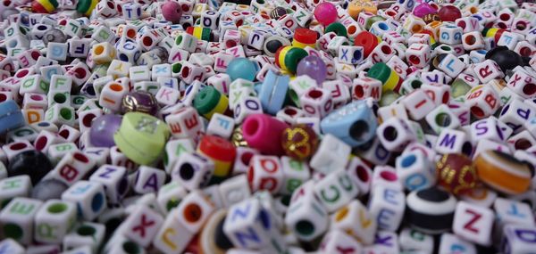 Full frame shot of alphabets with toy blocks for sale at market