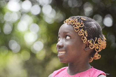 Close-up portrait of a girl looking away