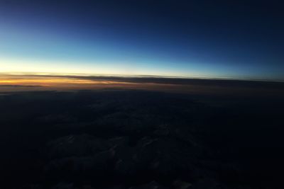 Scenic view of landscape against sky at night