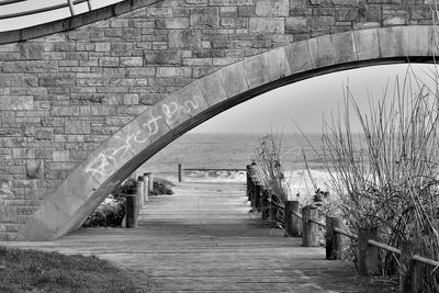 Bridge over water against sky