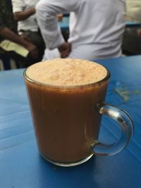 Close-up of coffee cup on table