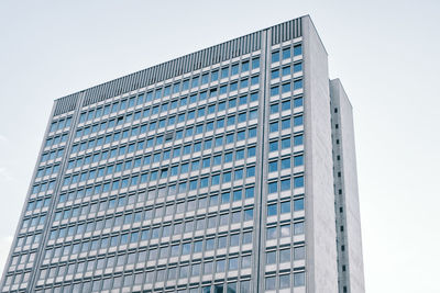 Low angle view of modern building against clear sky