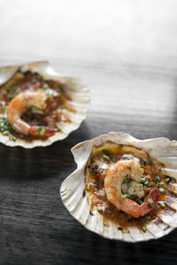 Close-up of serving food on table