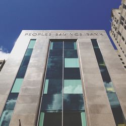 Low angle view of modern building against sky