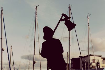 Silhouette of man against sky