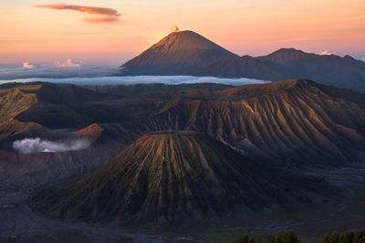 Arial view of volcanic mountains during sunset