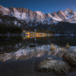 Scenic view of lake against mountain range