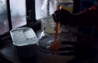 Close-up of hand holding drink