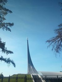 Low angle view of built structure against clear blue sky