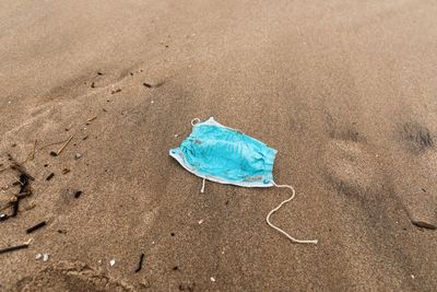 High angle view of blue umbrella on beach