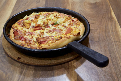 High angle view of pizza on table