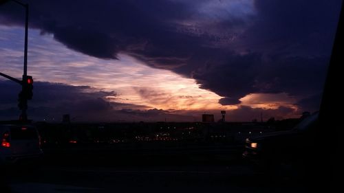 Dramatic sky over road at dusk