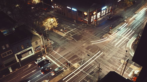 High angle view of vehicles on road at night