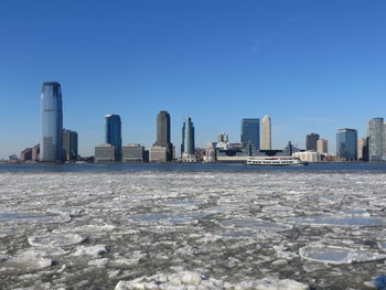 New yowk cityscape in winter against clear sky