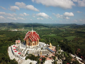 High angle view of building against cloudy sky