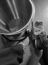 Low section of man wearing shoes